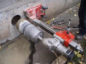 Просверлить отверстие в бетоне под трубу